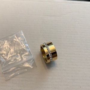 Cigar band ring with diamonds